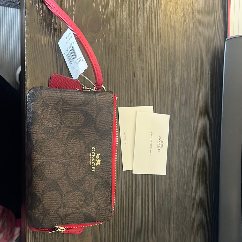 Brand new with tags Coach Wristlet